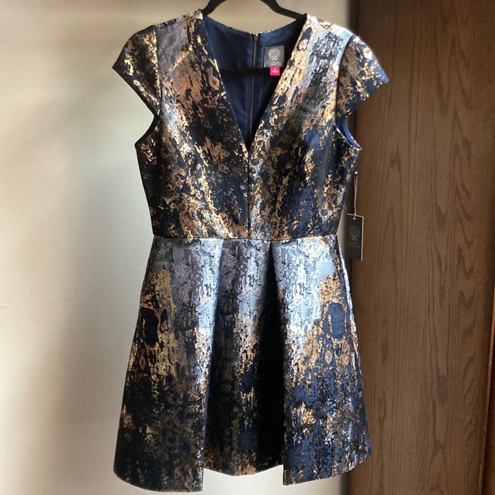 Vince Camuto short, fit and flare dress with pockets.